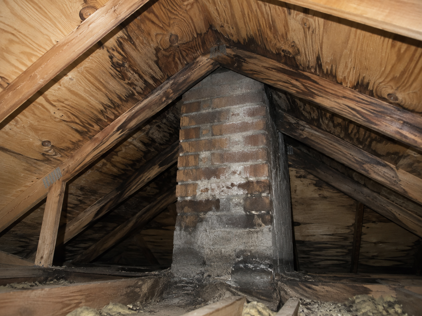 Attic chimney with severe water staining