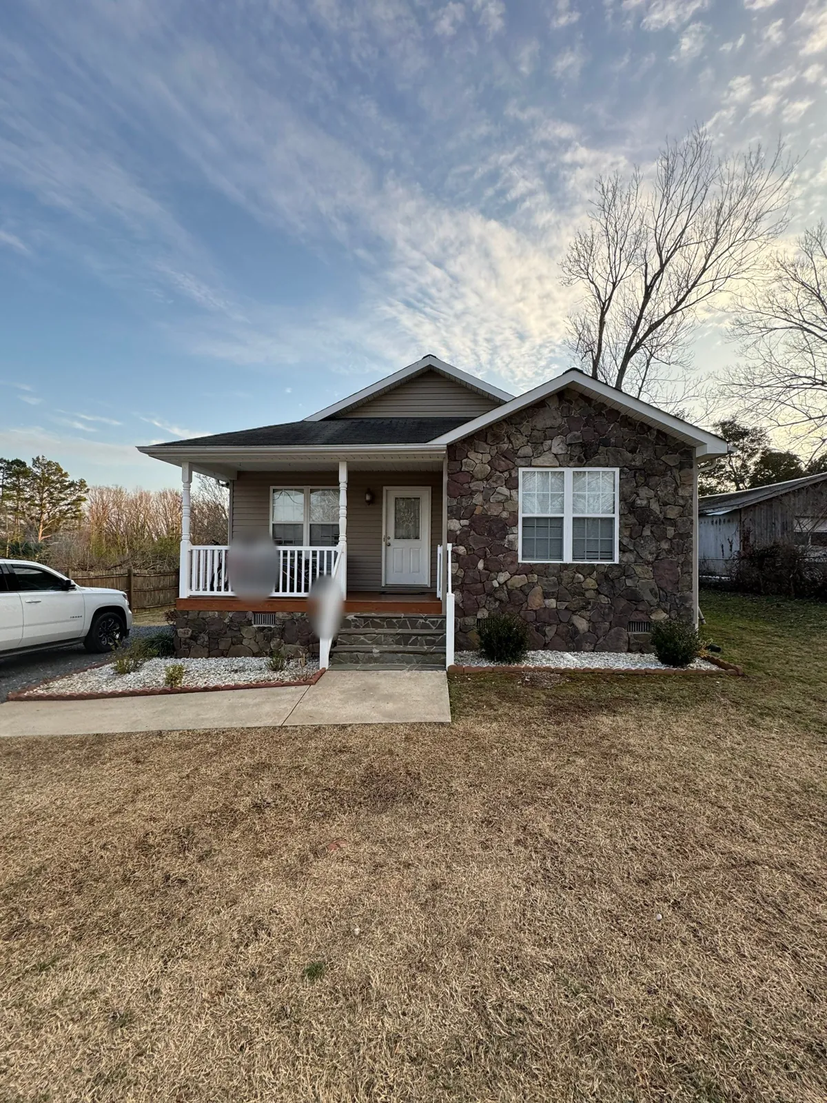 Stone-front ranch home in Asheboro, NC where Statewide installed new gutters