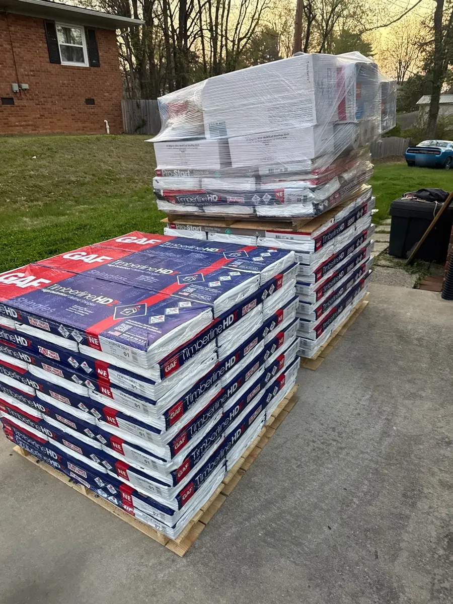 Pallets of GAF Timberline shingles delivered for a roof replacement in Thomasville, NC