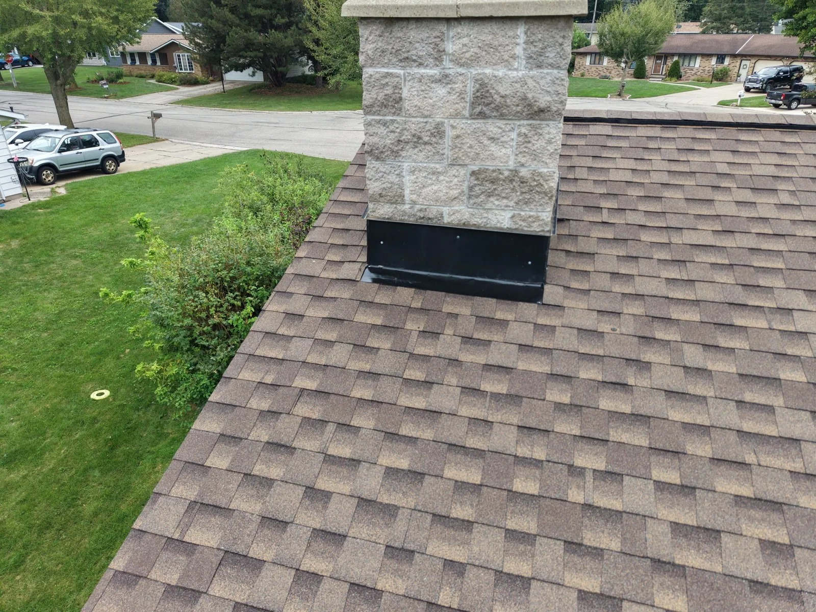 New chimney flashing on the GAF Timberline HDZ Barkwood roof