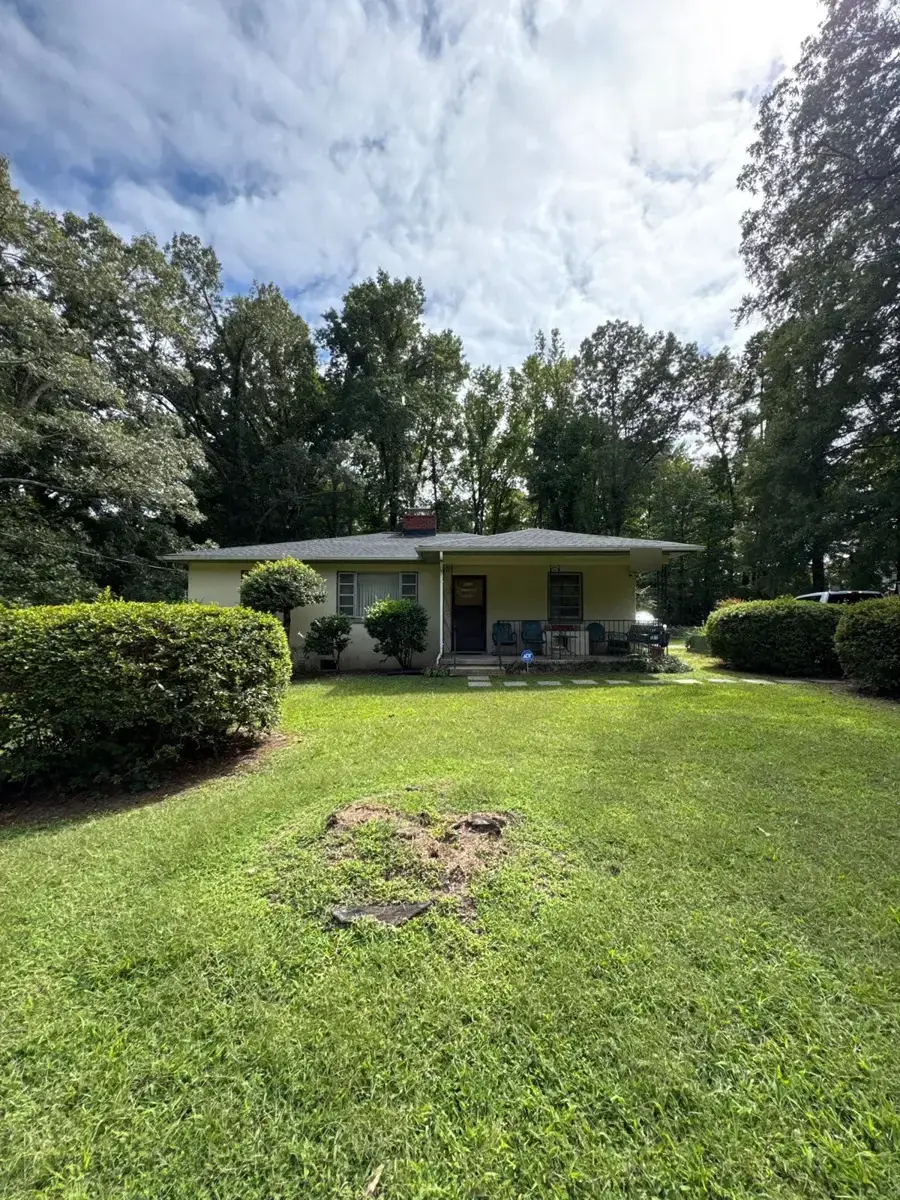 Brick ranch home on West Vandalia Road in Greensboro, NC after roof replacement