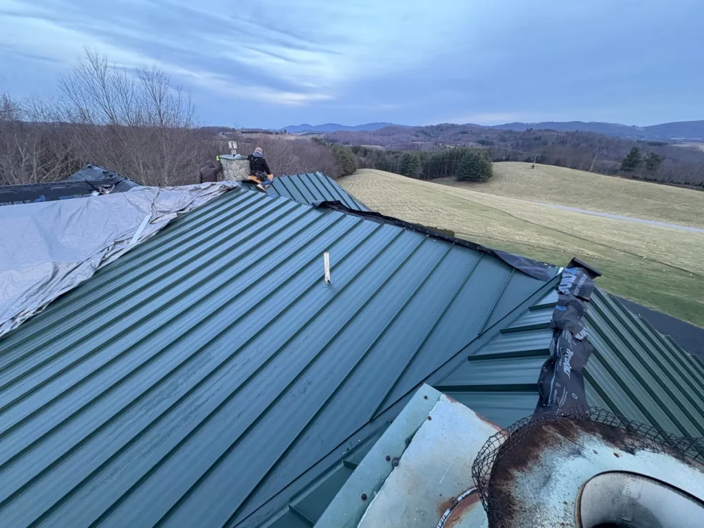 Hartford Green standing seam metal roof with a view of the Blue Ridge Mountains in Sparta, NC