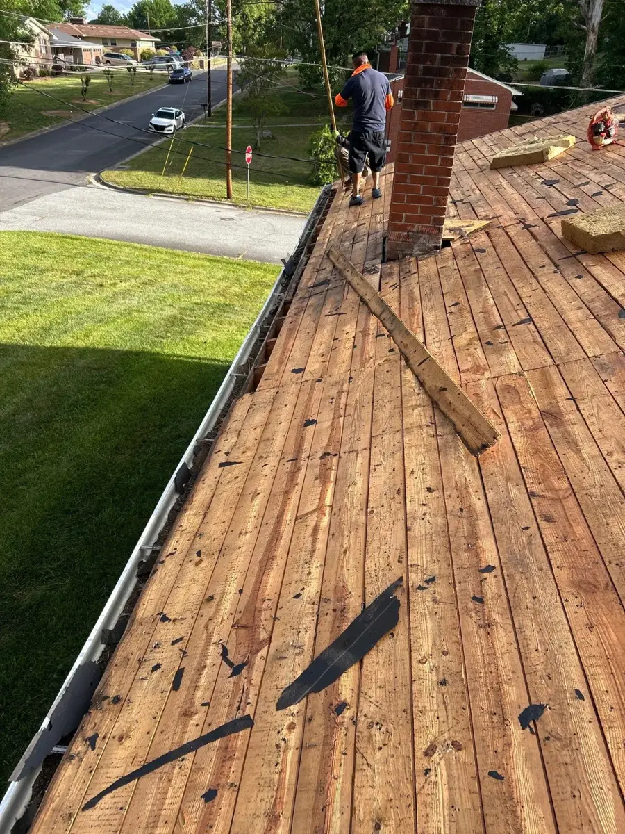 Roof torn off down to the wood decking during a roof replacement in High Point, NC