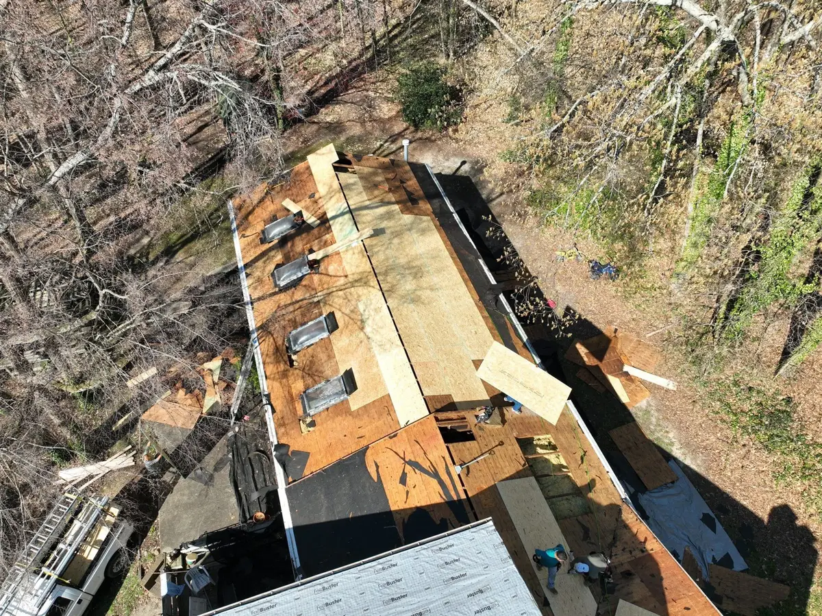 Roof opened up to replace rotted decking and rebuild skylight curbs in High Point, NC