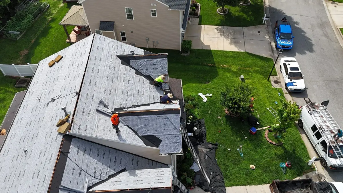 Synthetic underlayment going down during a roof replacement in High Point, NC