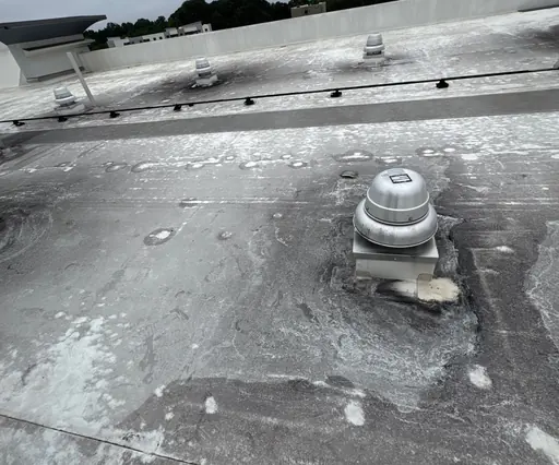 Commercial flat roof before repair in Kernersville, NC