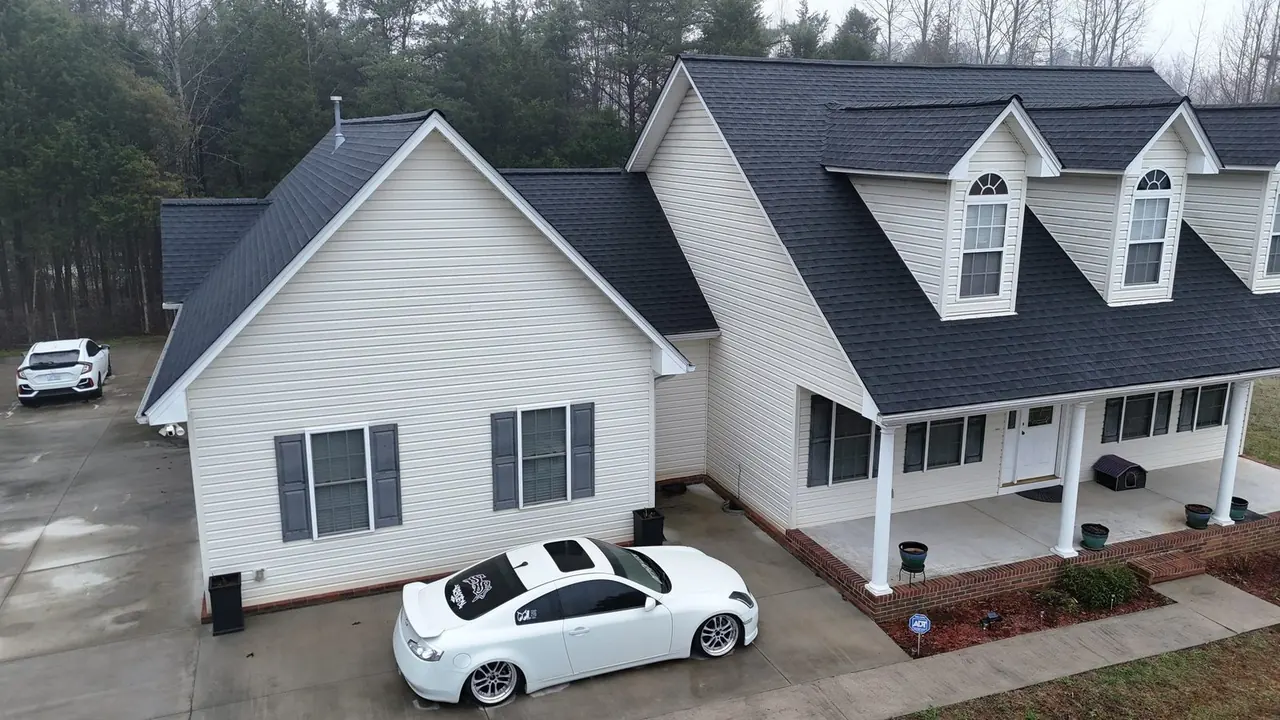 Drone view of a home in Lexington, NC after roof replacement