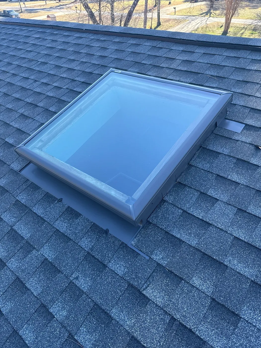 New skylight flashed into a new architectural shingle roof in Salisbury, NC