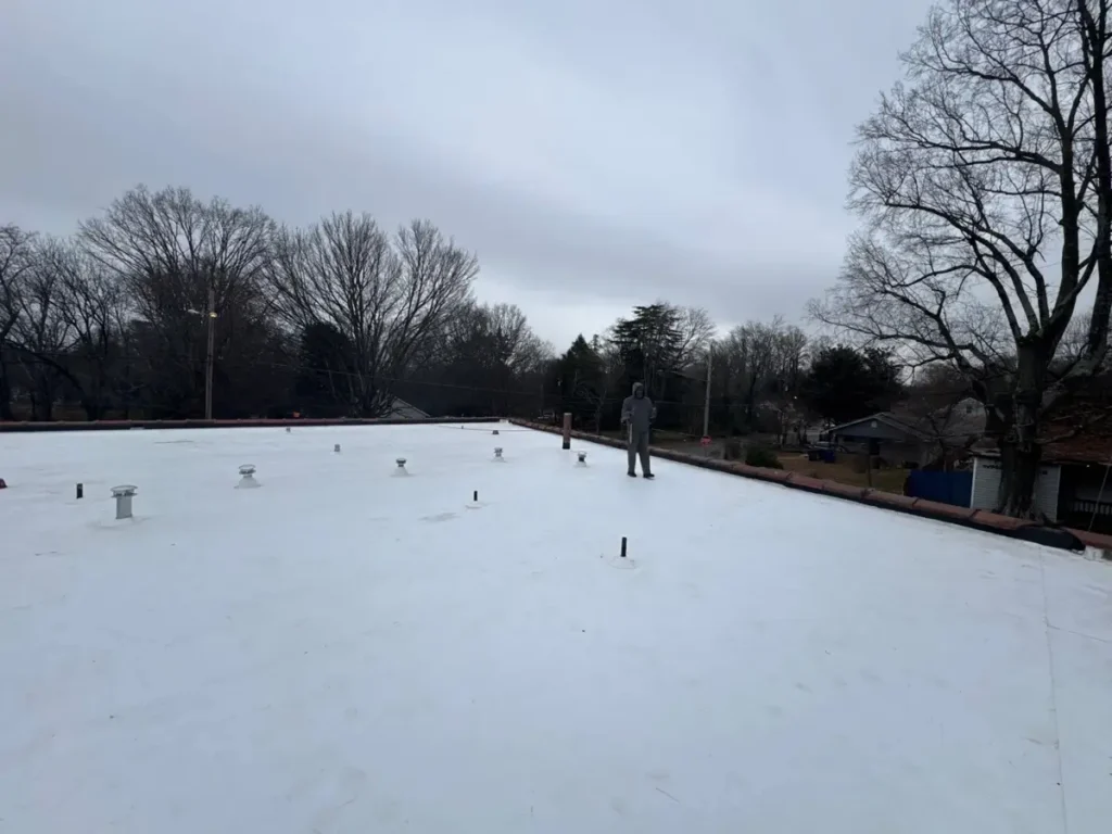 New white TPO membrane flat roof in Winston-Salem, NC after replacement